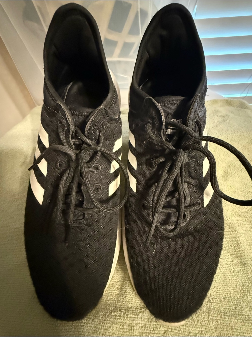 Adidas Women’s Black Athletic Sneakers with White Stripes